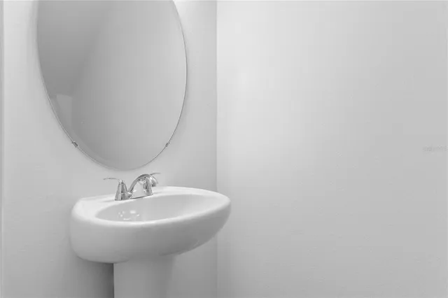 a sink with a mirror