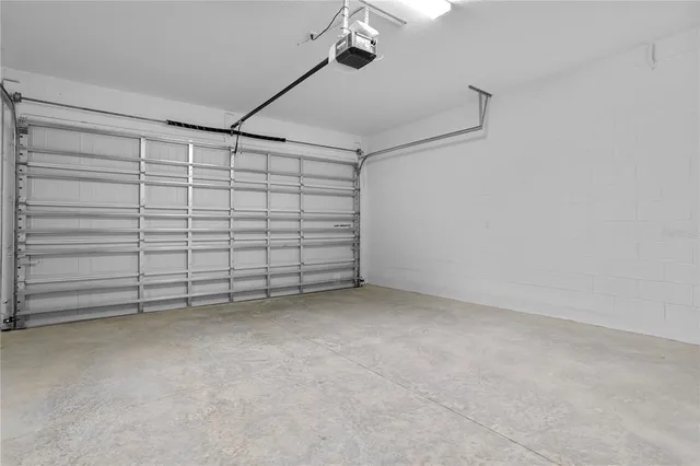 a view of a big yard with potted plants