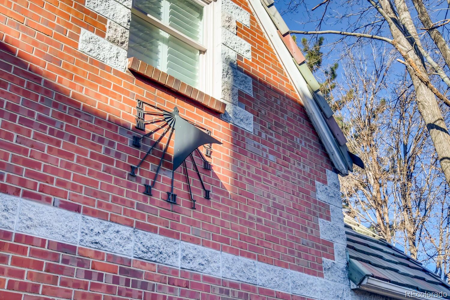 1635 Gilpin Street Denver, CO 80218 - Photo 39 of 39 a brick building with a street