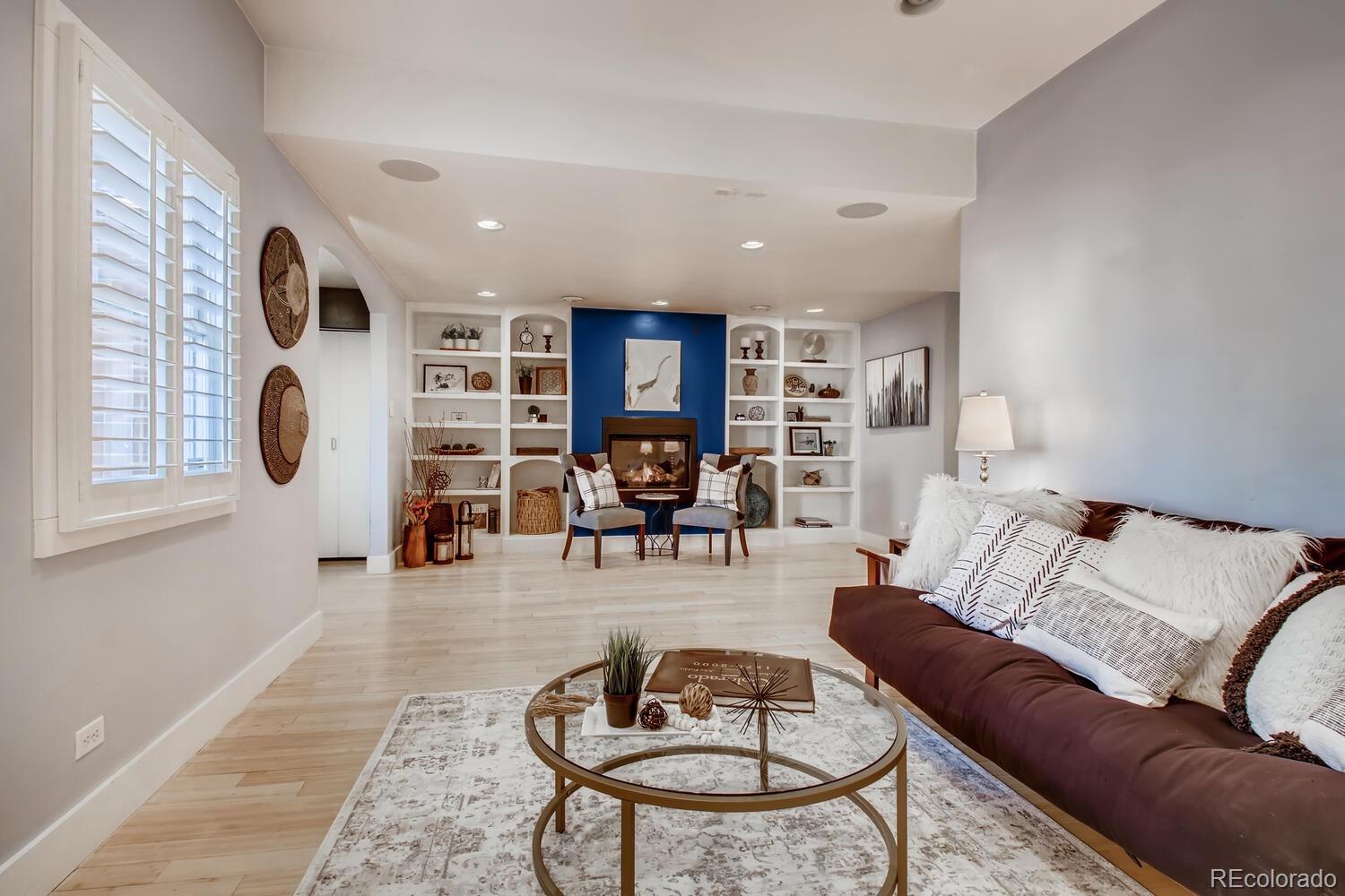 1635 Gilpin Street Denver, CO 80218 - Photo 5 of 39 a living room with furniture and a table