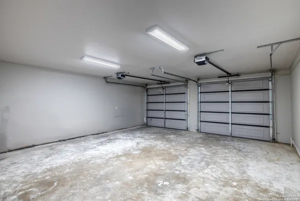 a view of a room with sink and wooden floor