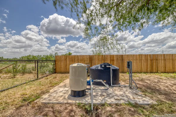 a view of a yard with an outdoor space