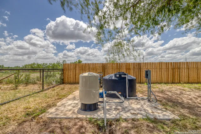 a view of a yard with an outdoor space