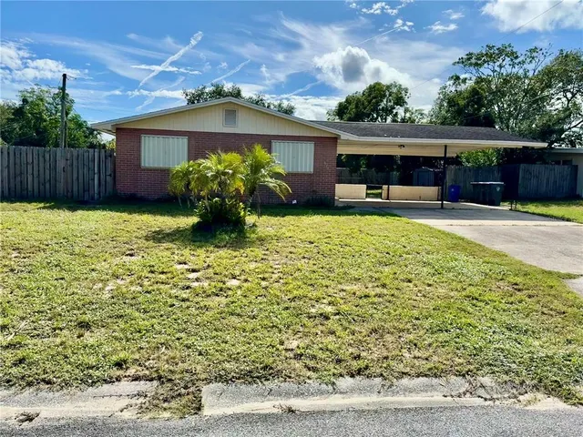 a house view with a garden space