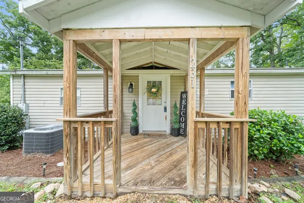 a front view of a house with a porch