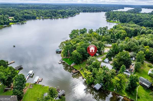 a view of a lake with a building in the background