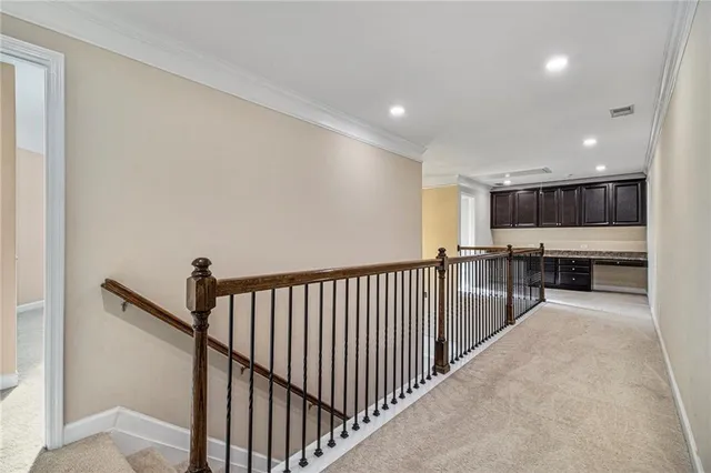 a view of empty room with a ceiling fan