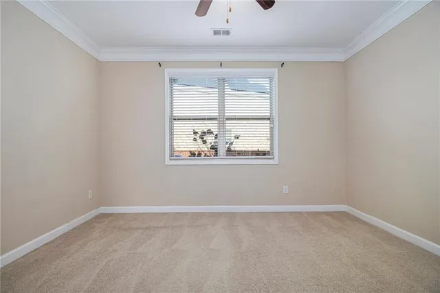 a en suite bathroom with a sink shower and a mirror