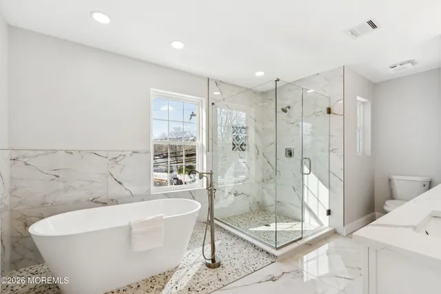 a view of an empty room with a fireplace