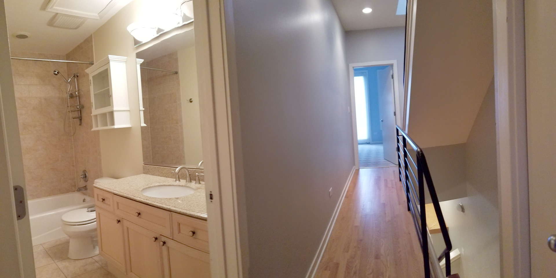 1229 West Madison Street, Unit Q Chicago, IL 60607 - Photo 13 of 32 a bathroom with a granite countertop sink toilet and shower