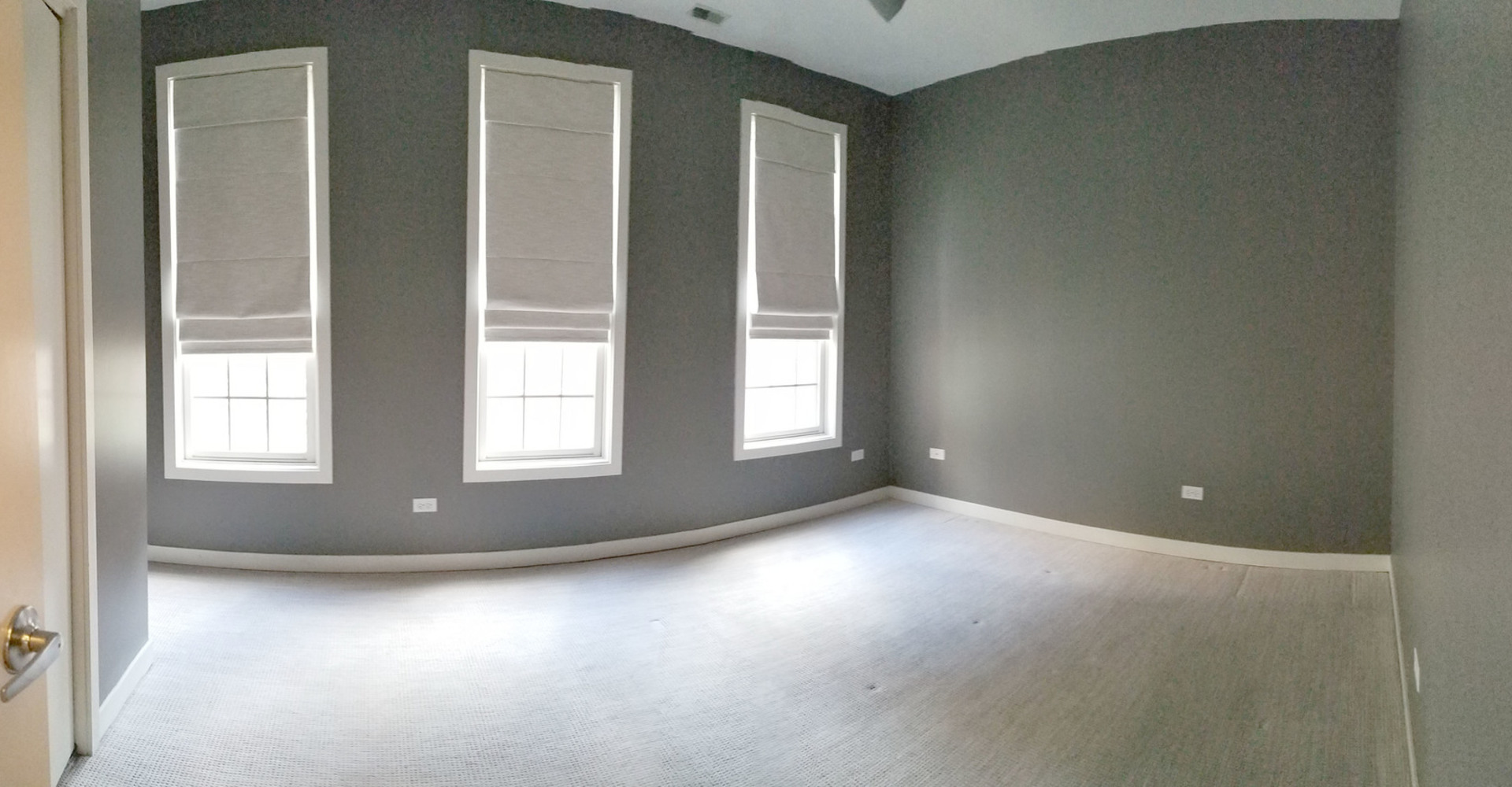 1229 West Madison Street, Unit Q Chicago, IL 60607 - Photo 22 of 32 an empty room with windows