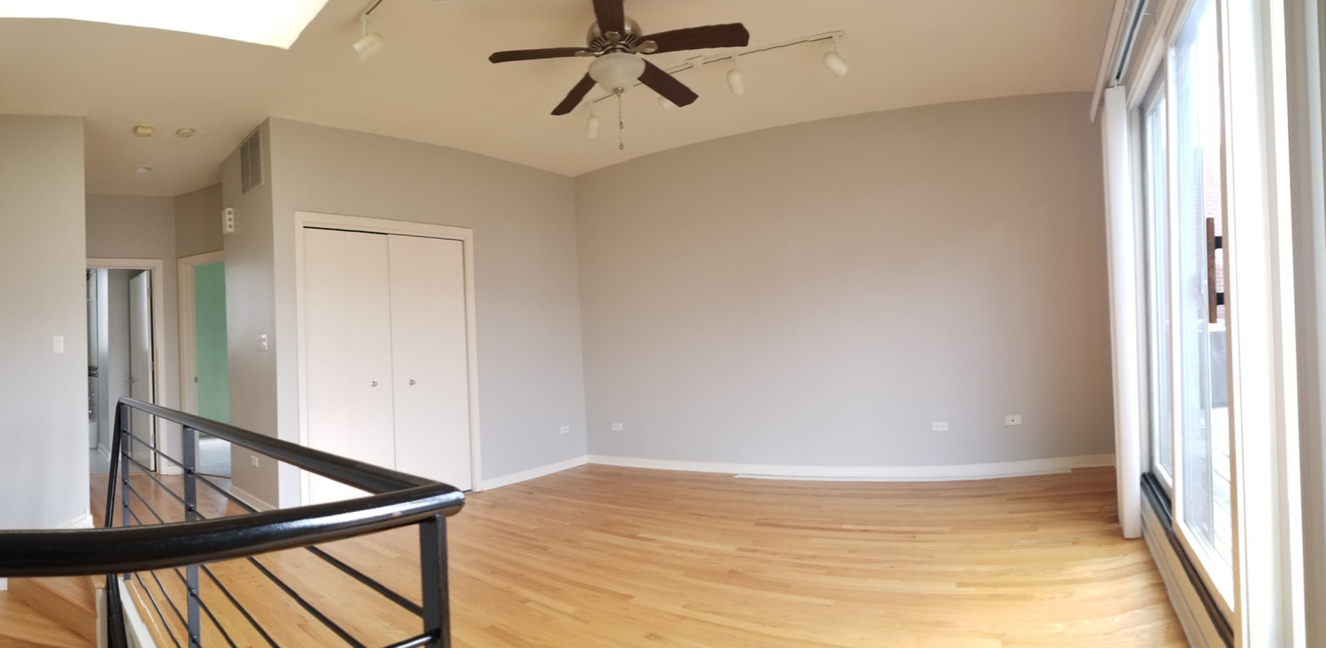 1229 West Madison Street, Unit Q Chicago, IL 60607 - Photo 29 of 32 a view of an empty room and window