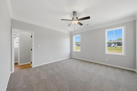 a view of an empty room with a window