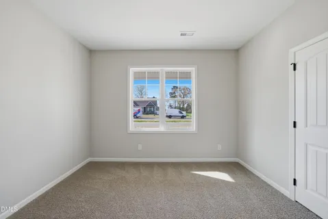 an empty room with a window