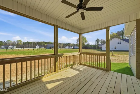 a view of a balcony with wooden floor