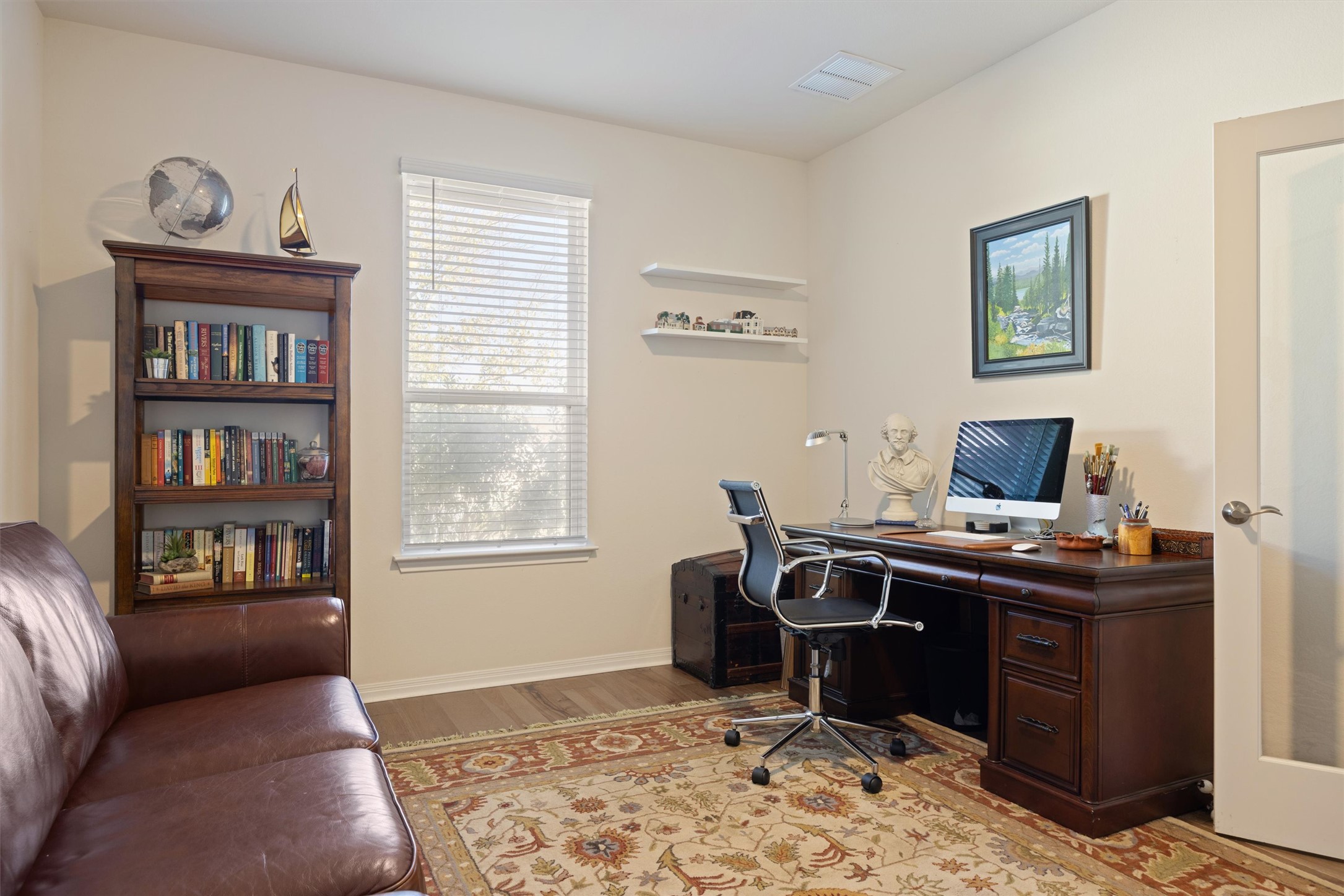 210 Raptor Beak Way Cedar Creek, TX 78612 - Photo 20 of 36 a view of a workspace with furniture and a window