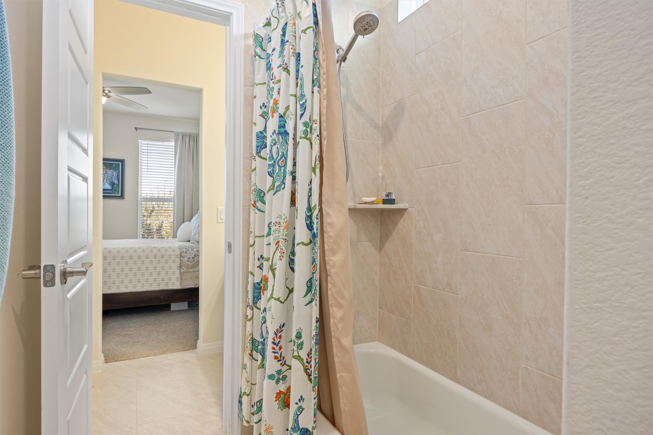 210 Raptor Beak Way Cedar Creek, TX 78612 - Photo 24 of 36 a bathroom with a shower curtain and a sink