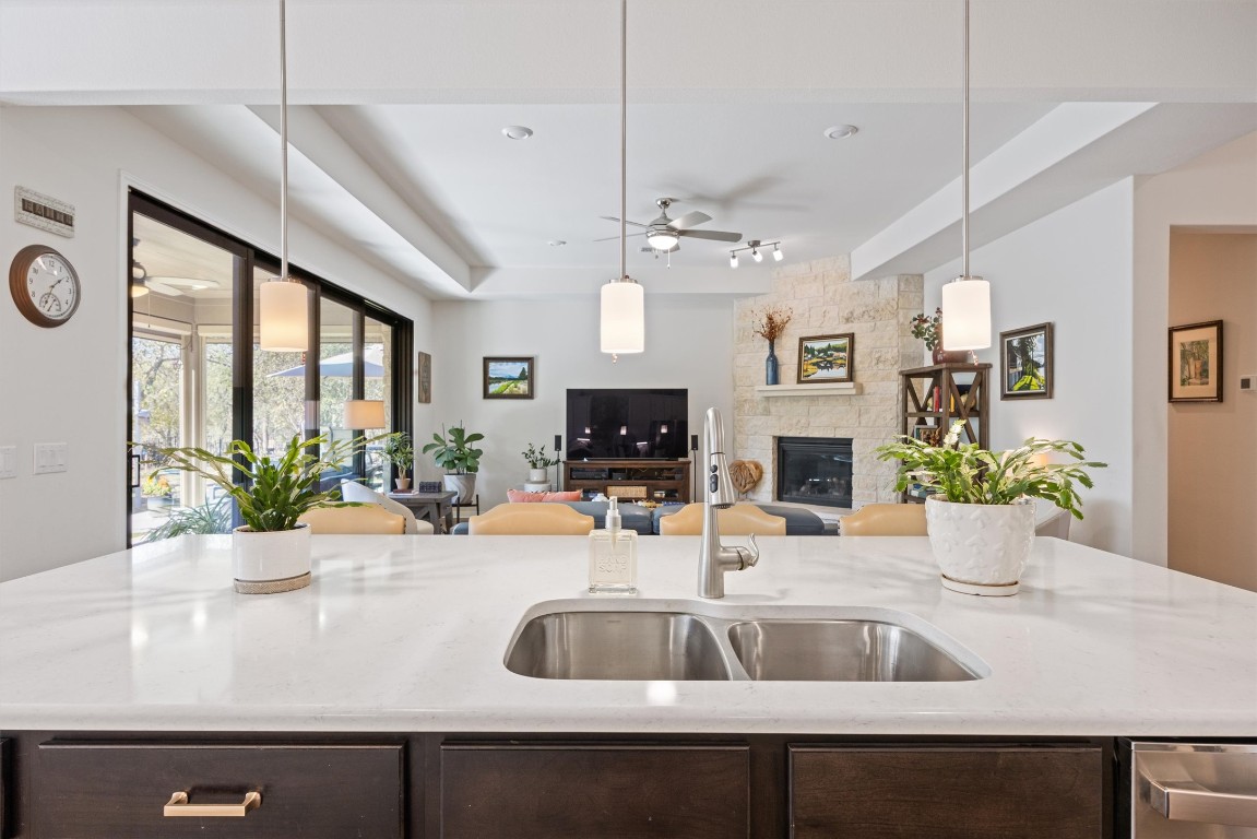 210 Raptor Beak Way Cedar Creek, TX 78612 - Photo 7 of 36 a kitchen with a sink and a large window