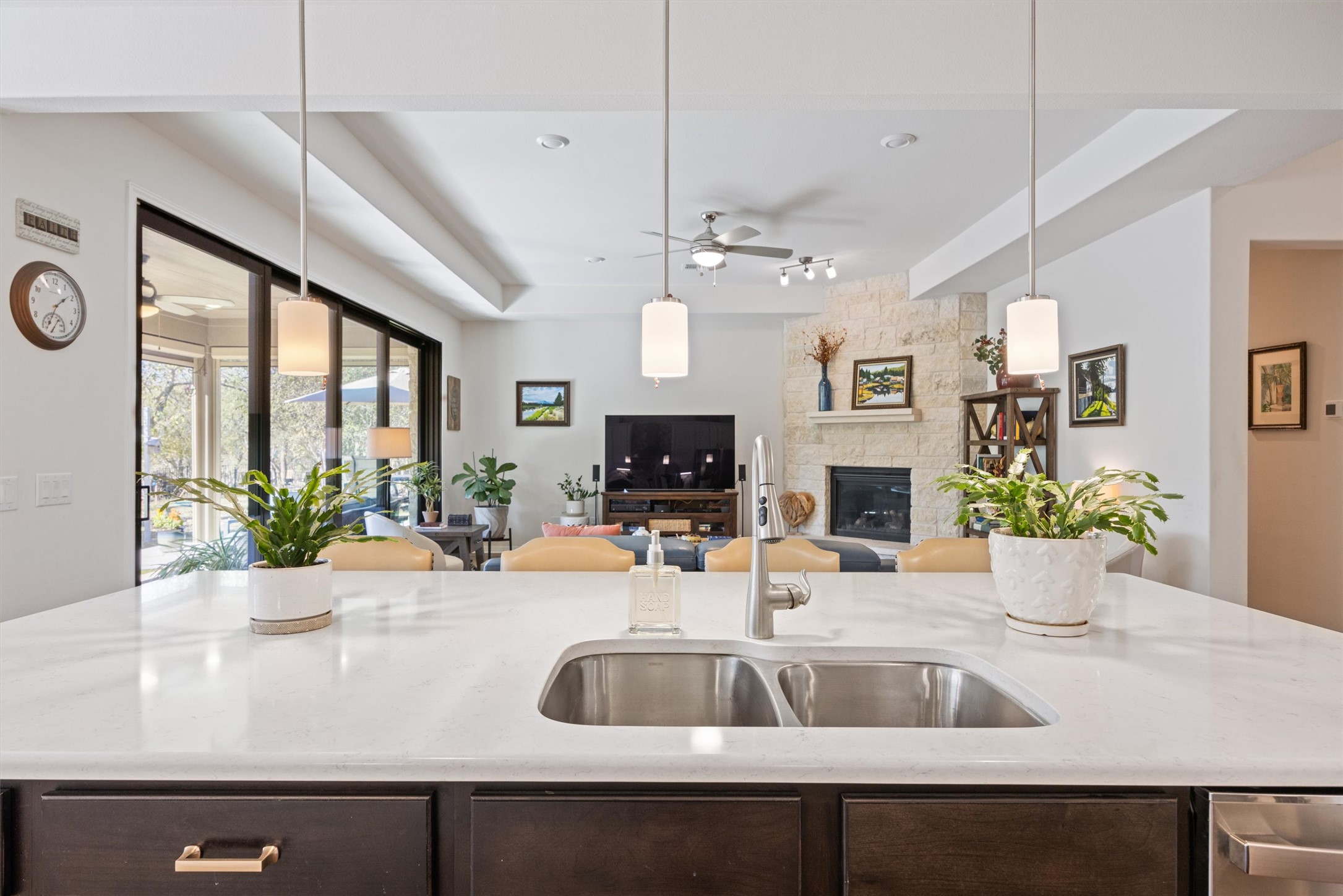 210 Raptor Beak Way Cedar Creek, TX 78612 - Photo 8 of 36 a kitchen with a sink and a large window