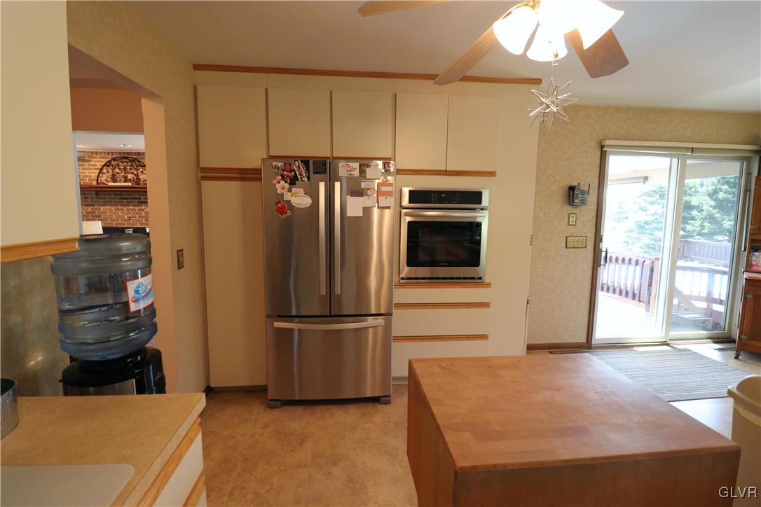 103 James Way Road Bath, PA 18014 - Photo 15 of 50 a kitchen with stainless steel appliances granite countertop a refrigerator and a sink