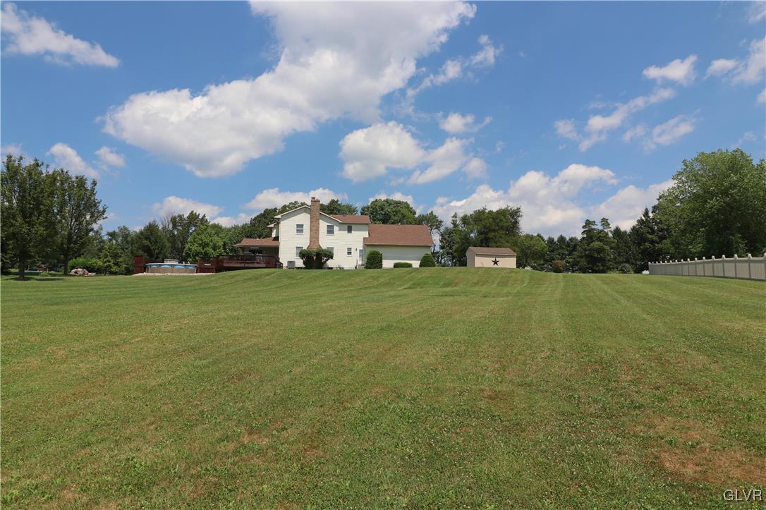 103 James Way Road Bath, PA 18014 - Photo 50 of 50 a view of a green field with house in the background