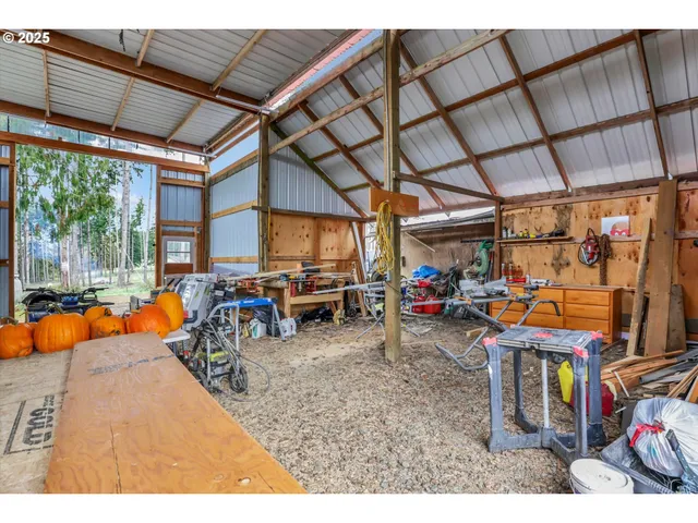 a view of a garage with a table and chairs