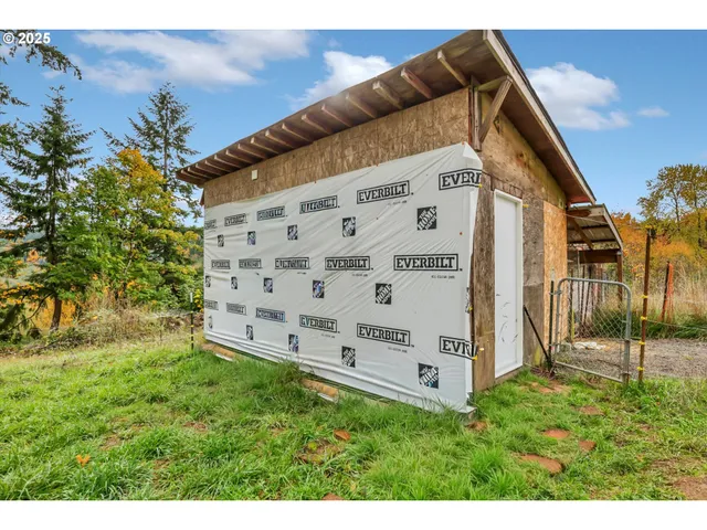 a view of a balcony with furniture and a rug