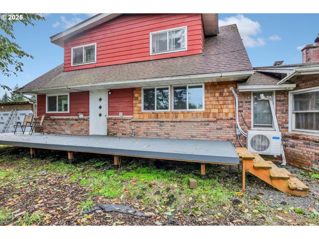 a house view with a wooden fencing