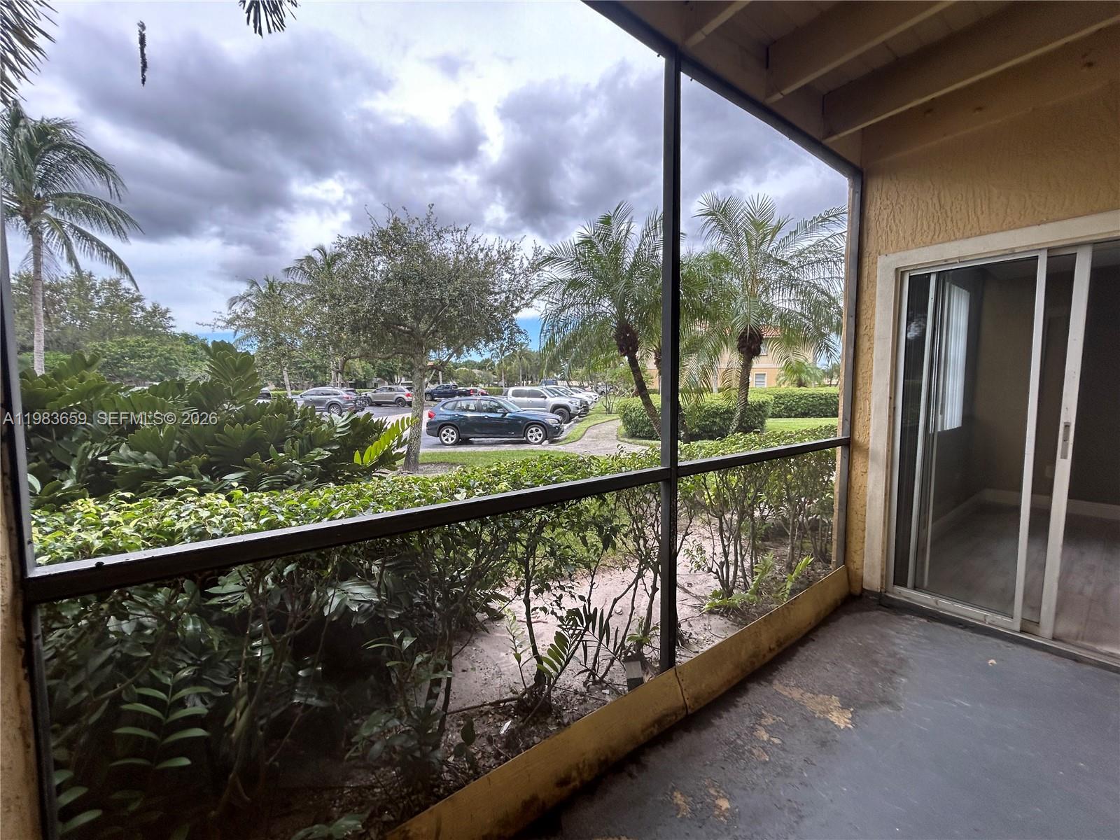 1263 Southwest 46th Avenue, Unit 2109 Pompano Beach, FL 33069 - Photo 9 of 18 a view of city from a balcony