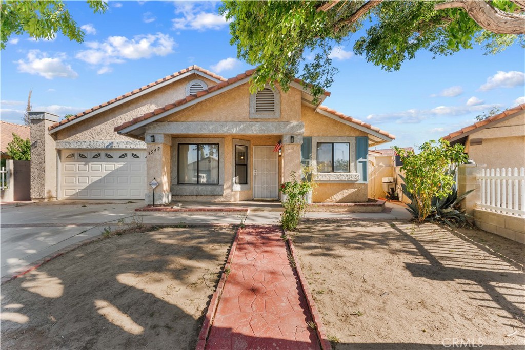 3542 East Ave R 10 Palmdale, CA 93550 - Photo 2 of 35 front view of a house