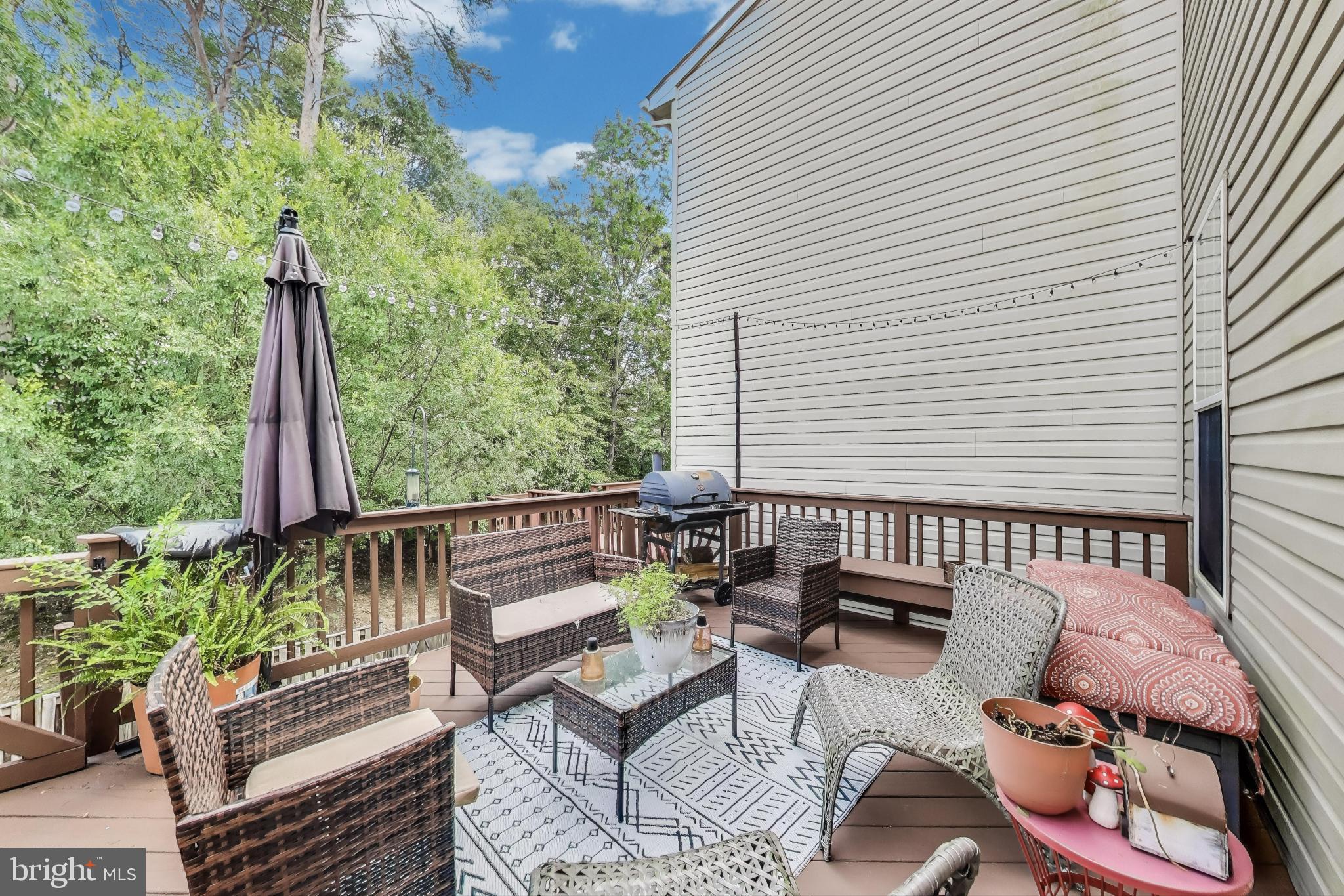 839 Patuxent Run Circle Odenton, MD 21113 - Photo 19 of 28 a view of a patio with couches chairs and potted plants