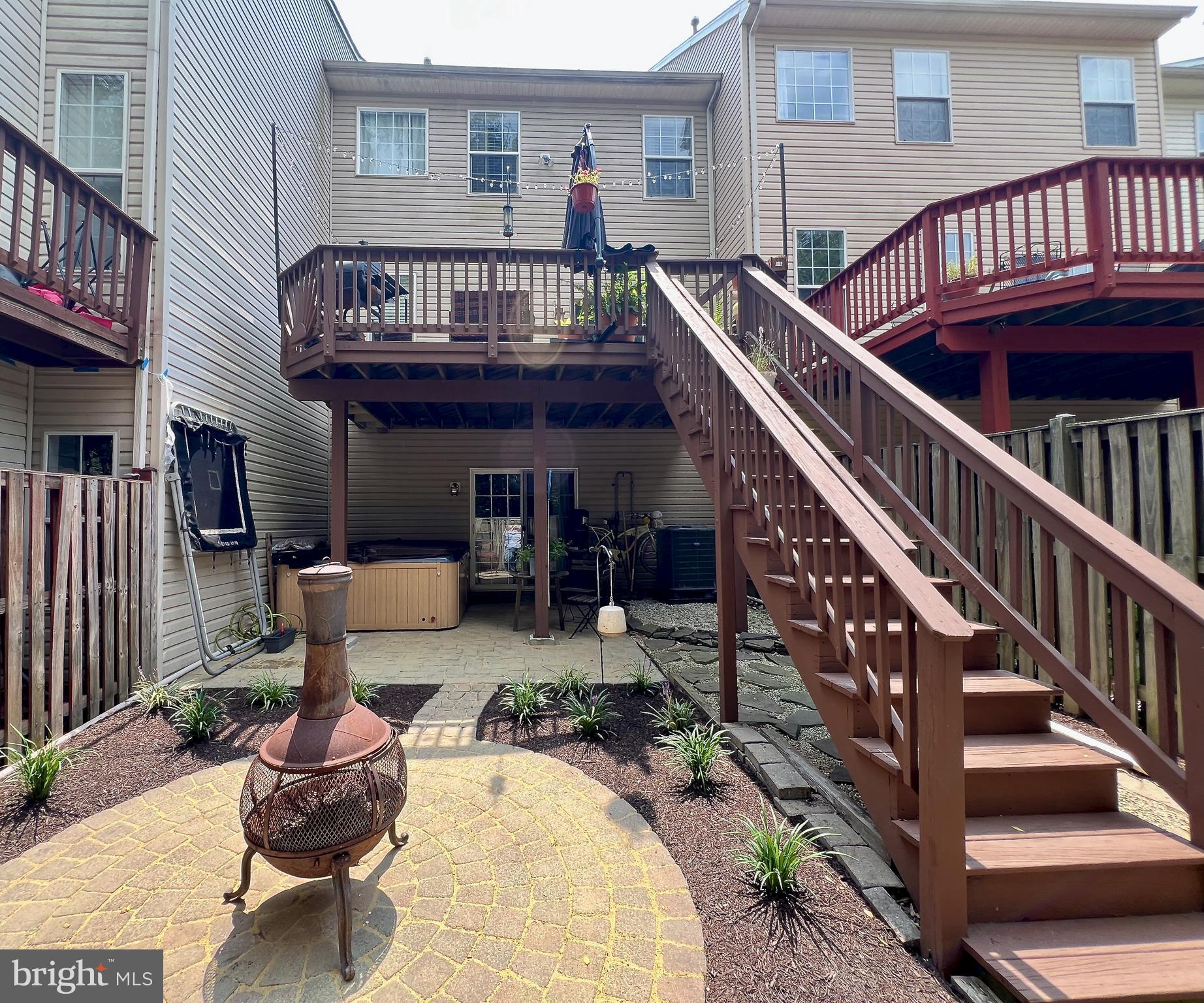 839 Patuxent Run Circle Odenton, MD 21113 - Photo 23 of 28 a view of a house with backyard and sitting area