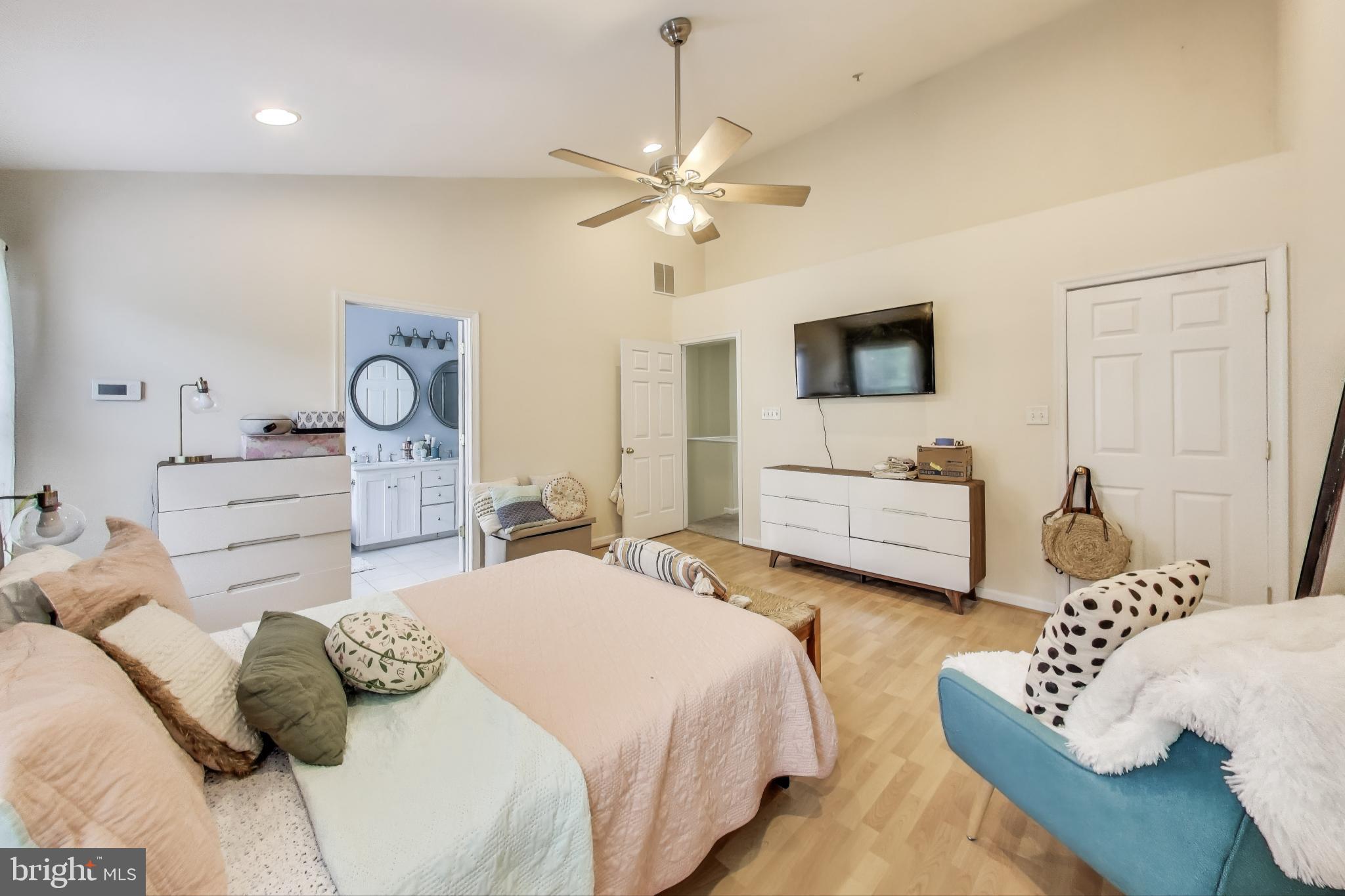 839 Patuxent Run Circle Odenton, MD 21113 - Photo 9 of 28 a bedroom with bed and a flat screen tv