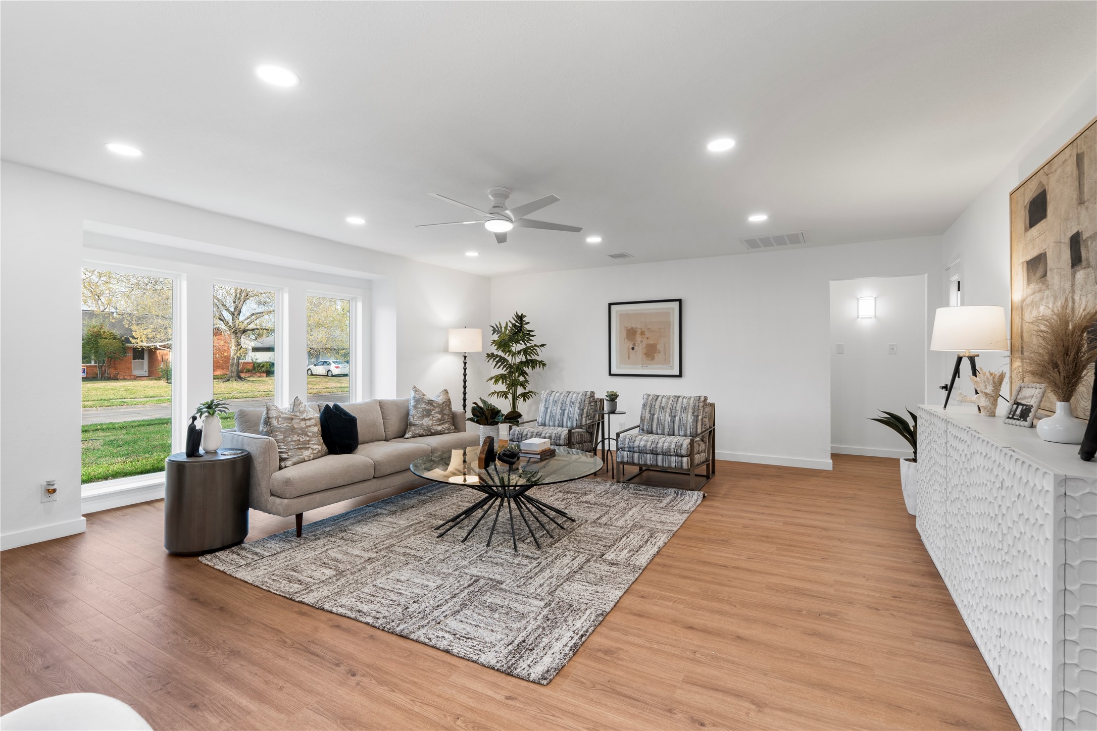 5023 Redstart Street Houston, TX 77035 - Photo 6 of 34 This versatile space effortlessly connects the living and dining areas, anchored by a fresh, neutral palette and modern fixtures.