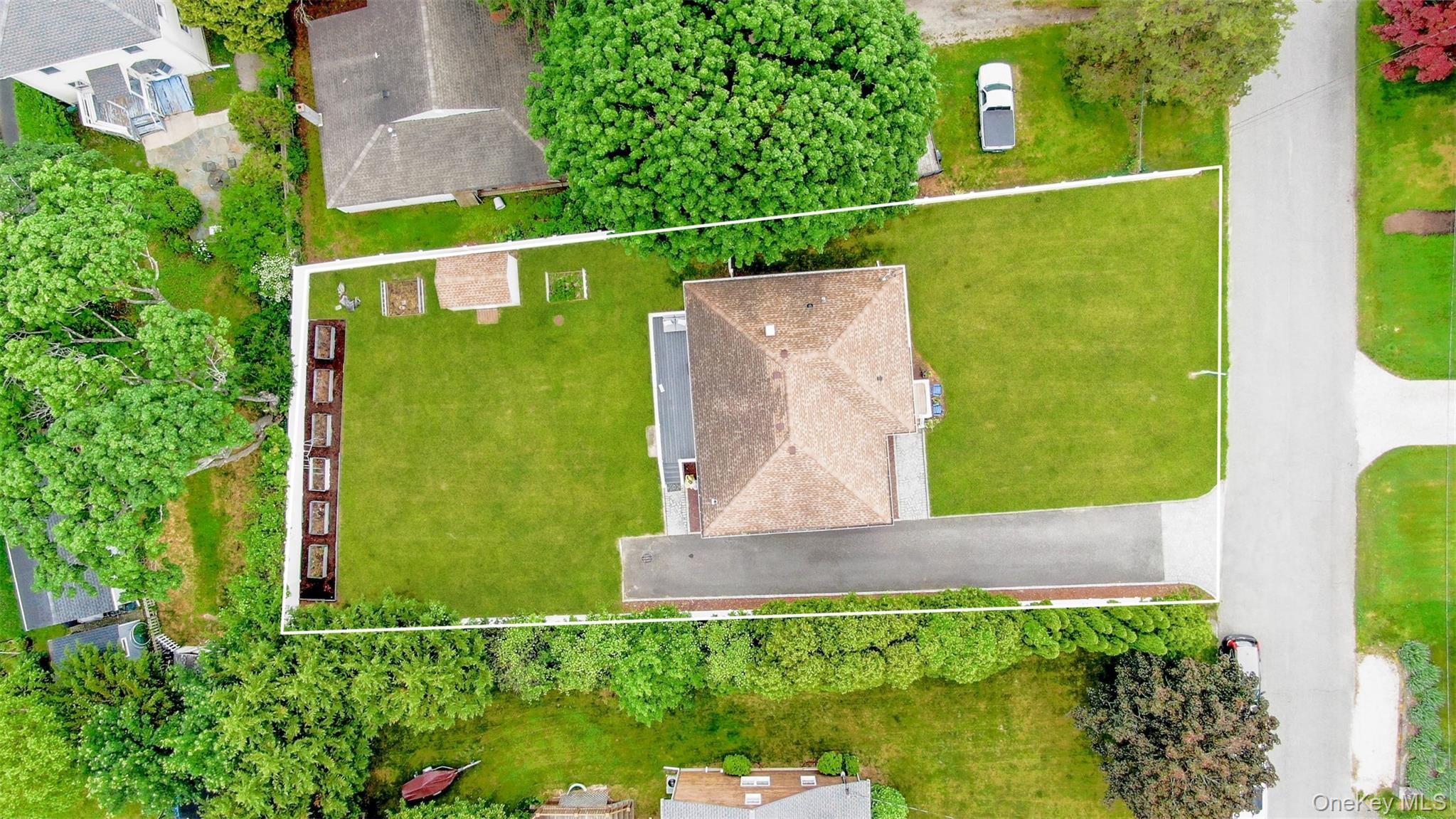 315 Wicks Road New Suffolk, NY 11956 - Photo 28 of 28 an aerial view of a house