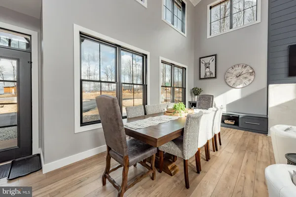 a bathroom with a tub sink and toilet
