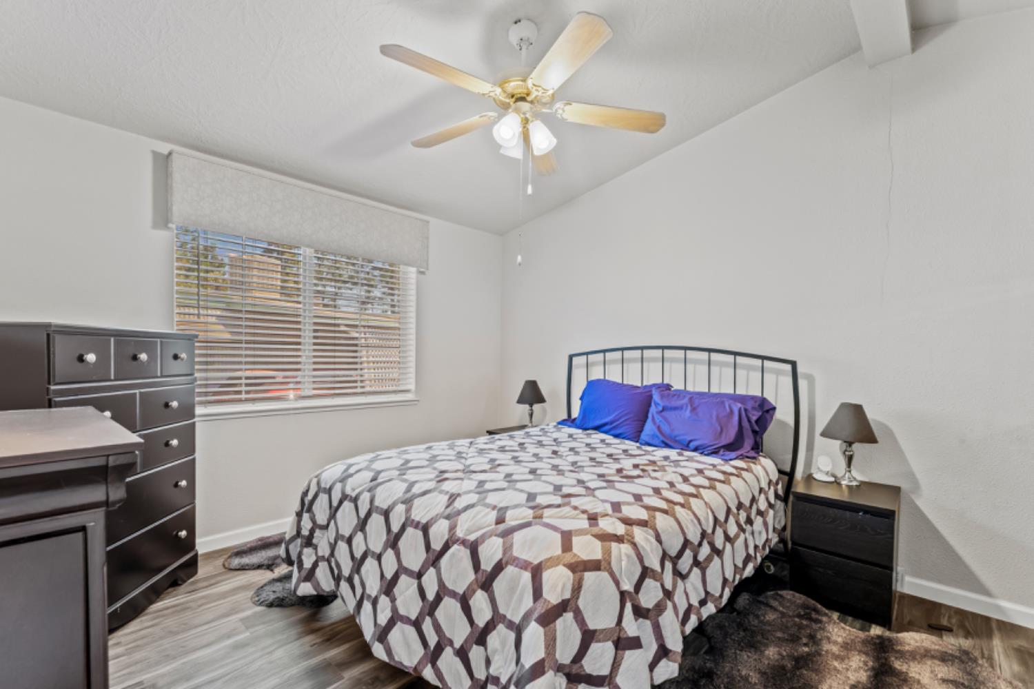 96 Monterey Lane Folsom, CA 95630 - Photo 12 of 27 a bedroom with a bed and a tv