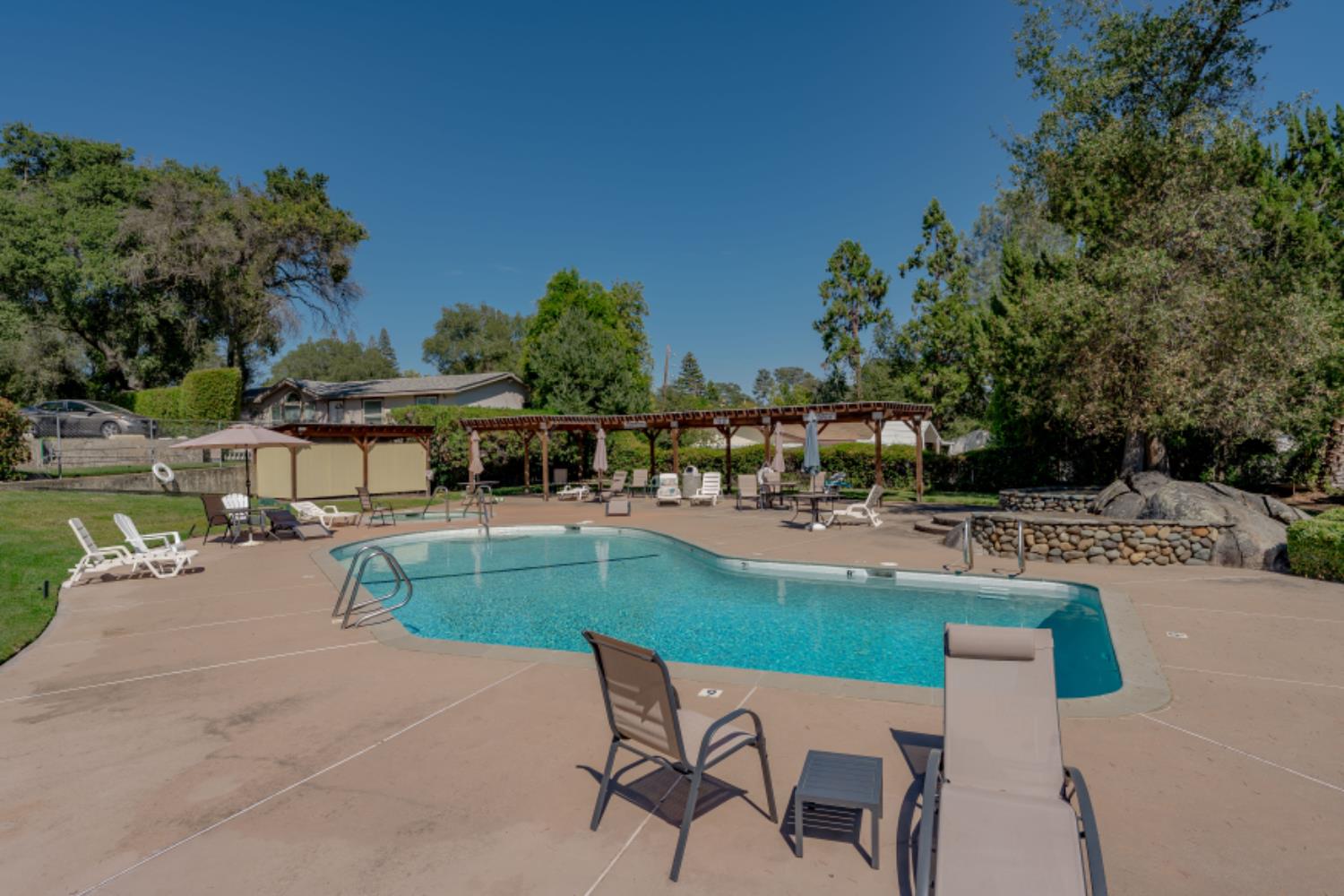 96 Monterey Lane Folsom, CA 95630 - Photo 17 of 27 a view of a swimming pool with a patio