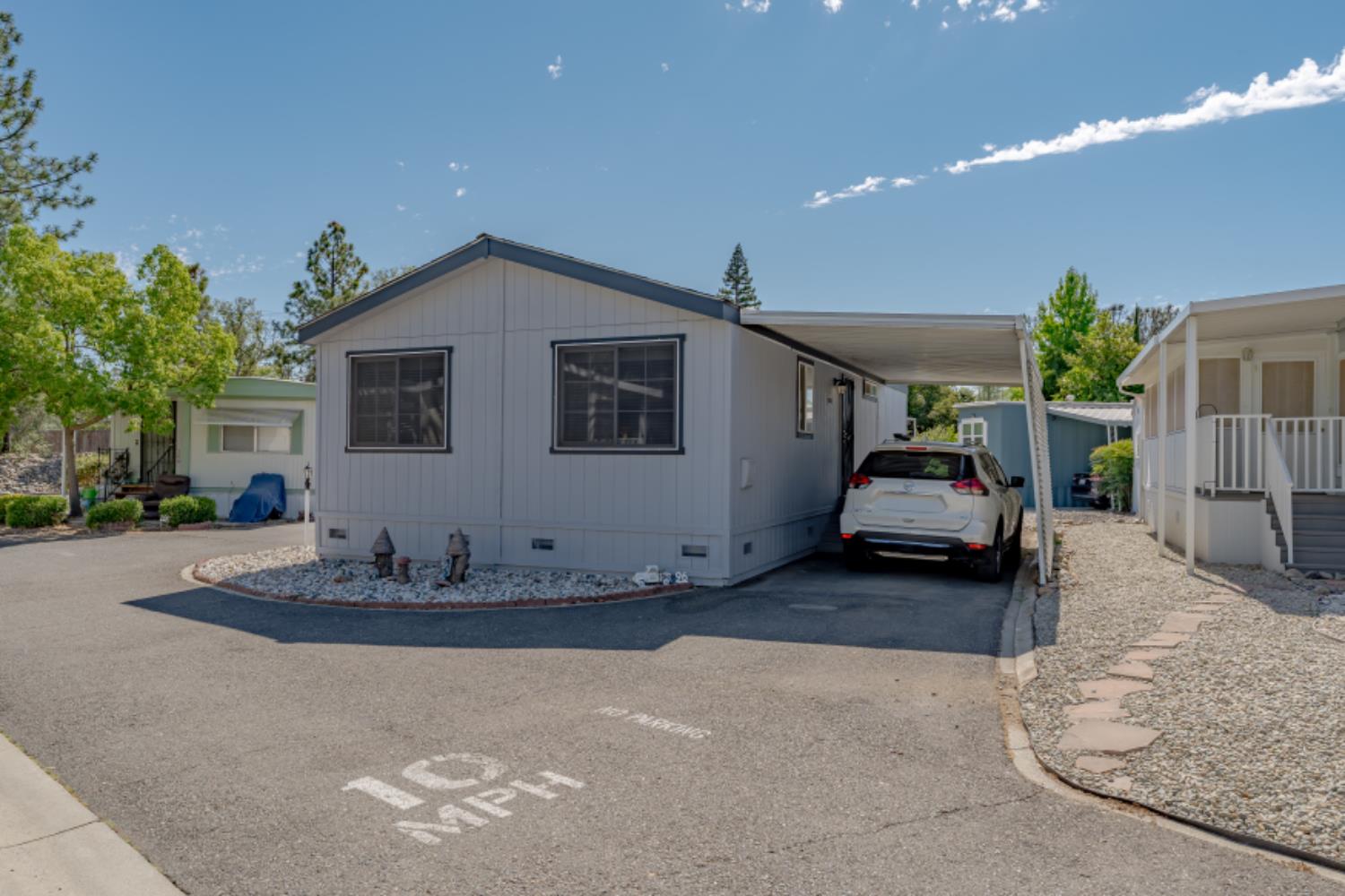 96 Monterey Lane Folsom, CA 95630 - Photo 19 of 27 a view of two house with a yard and garage