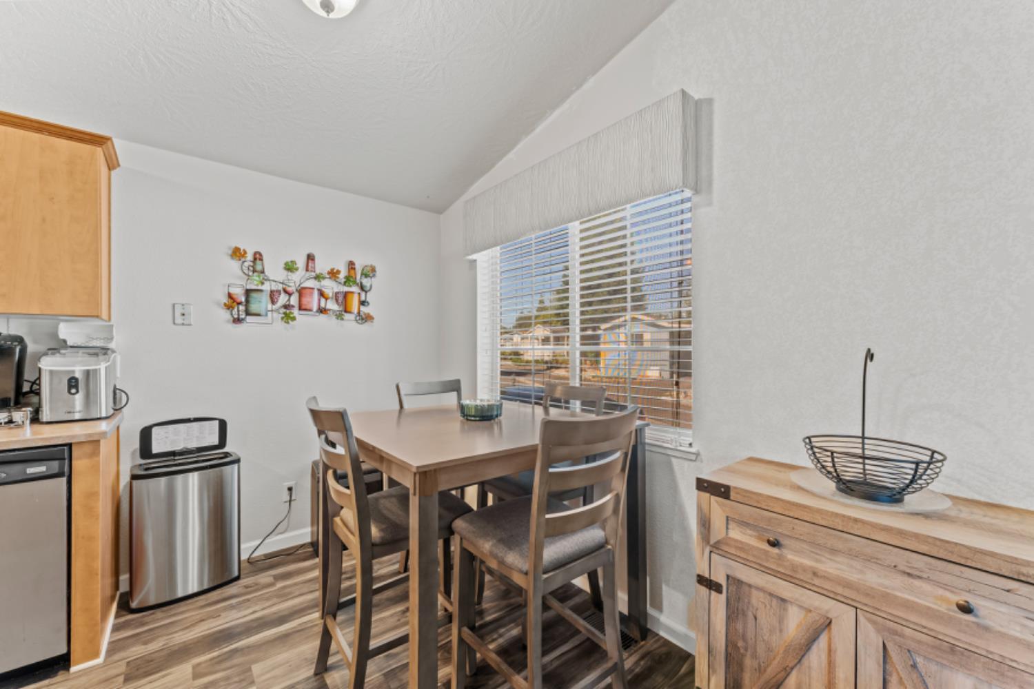 96 Monterey Lane Folsom, CA 95630 - Photo 2 of 27 a view of a kitchen with a table and chairs
