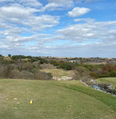 a view of lake with mountain