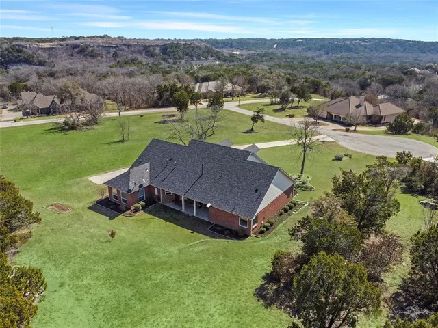 an aerial view of a house with garden