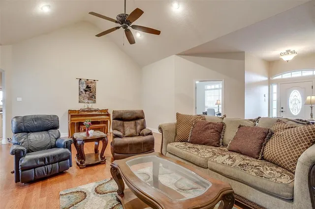 a living room with furniture and a couch