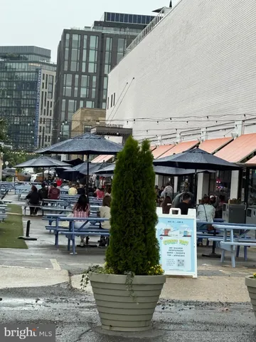 a view of a building with sitting area
