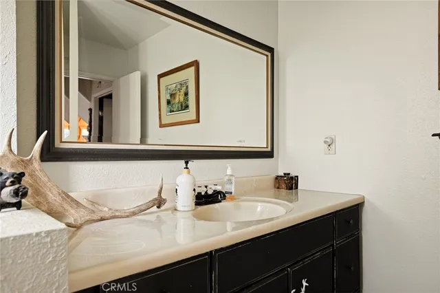 a bathroom with a tub and shower curtain