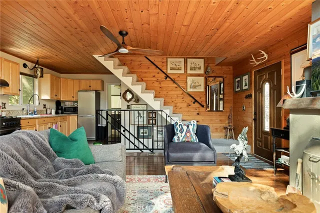 a kitchen with stainless steel appliances a stove sink and cabinets