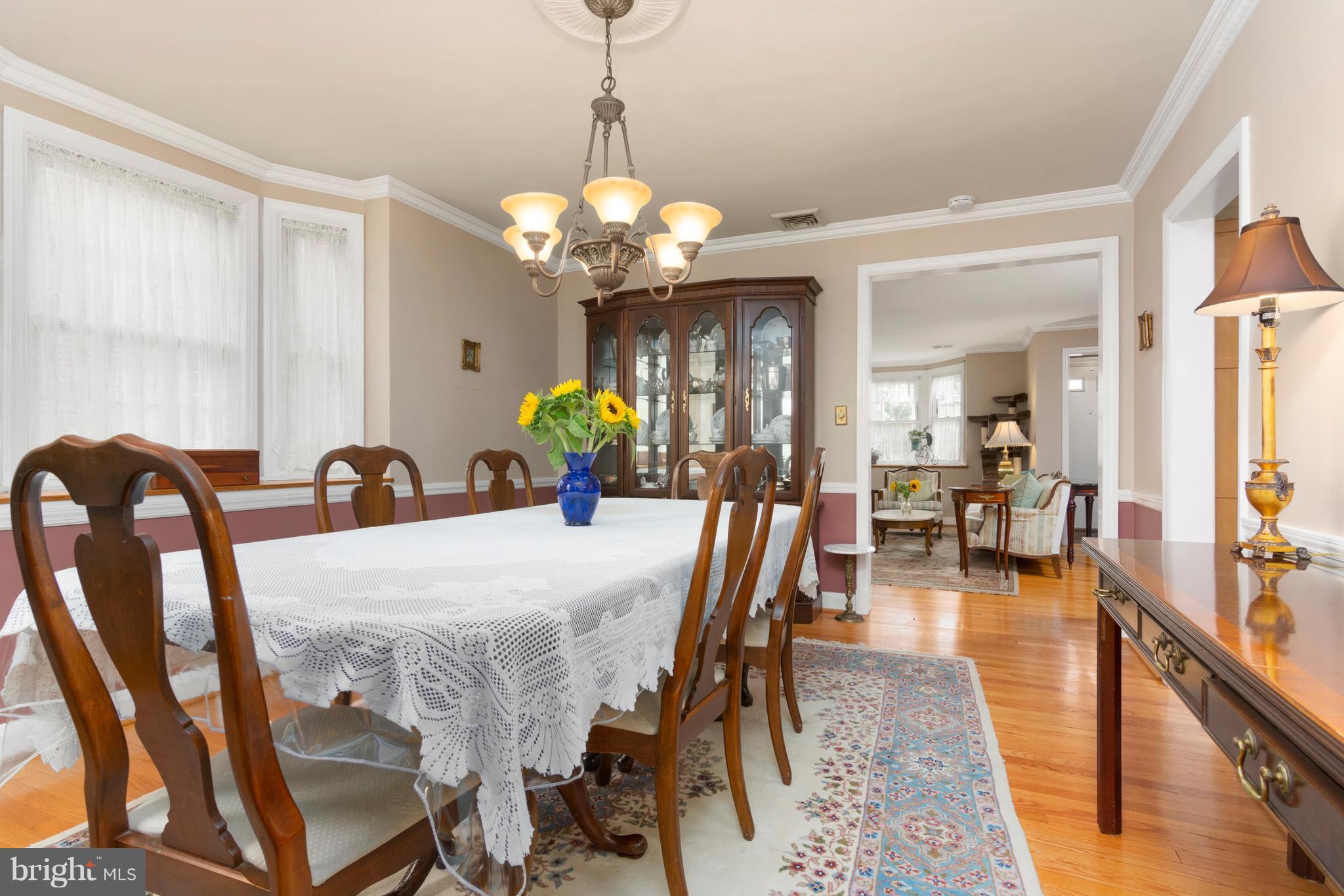 426 Academy Road Baltimore, MD 21228 - Photo 11 of 30 Dining Room opens to living room with HWD floors