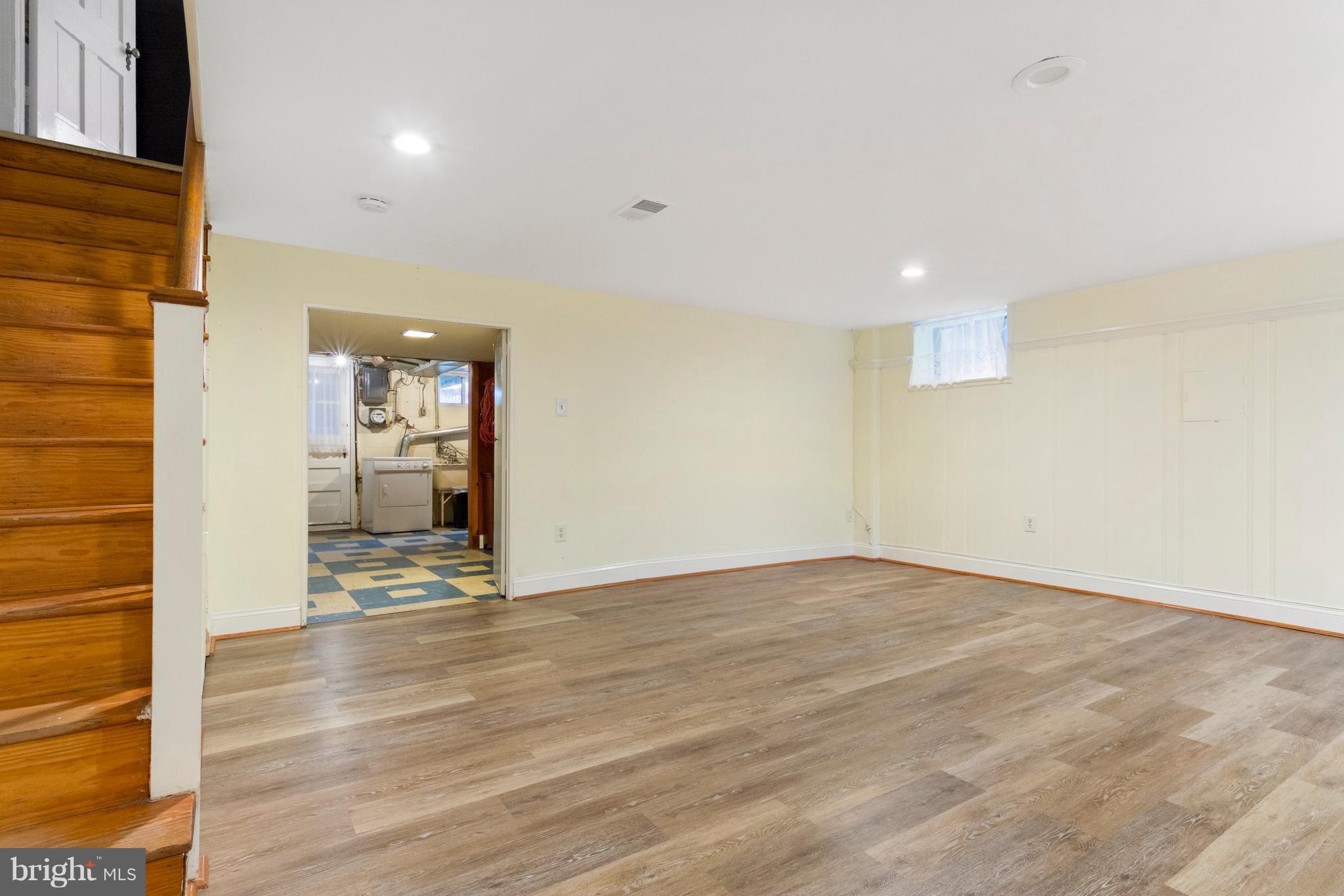 426 Academy Road Baltimore, MD 21228 - Photo 24 of 30 Family Room on lower level, new floors and paint
