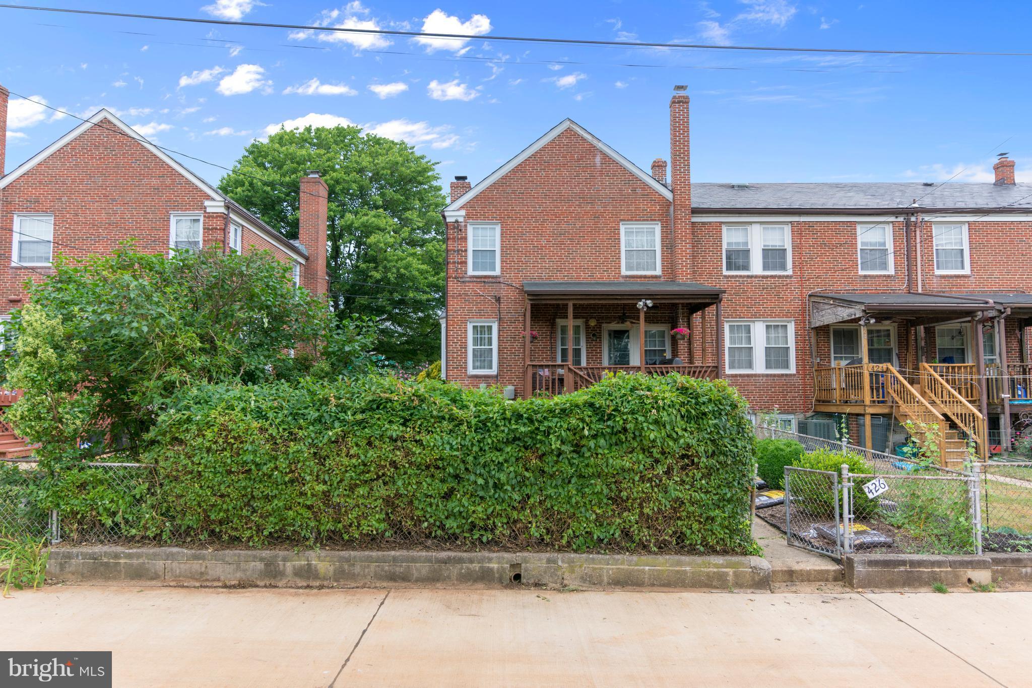 426 Academy Road Baltimore, MD 21228 - Photo 30 of 30 Privacy provided by hedgerow and fenced yard