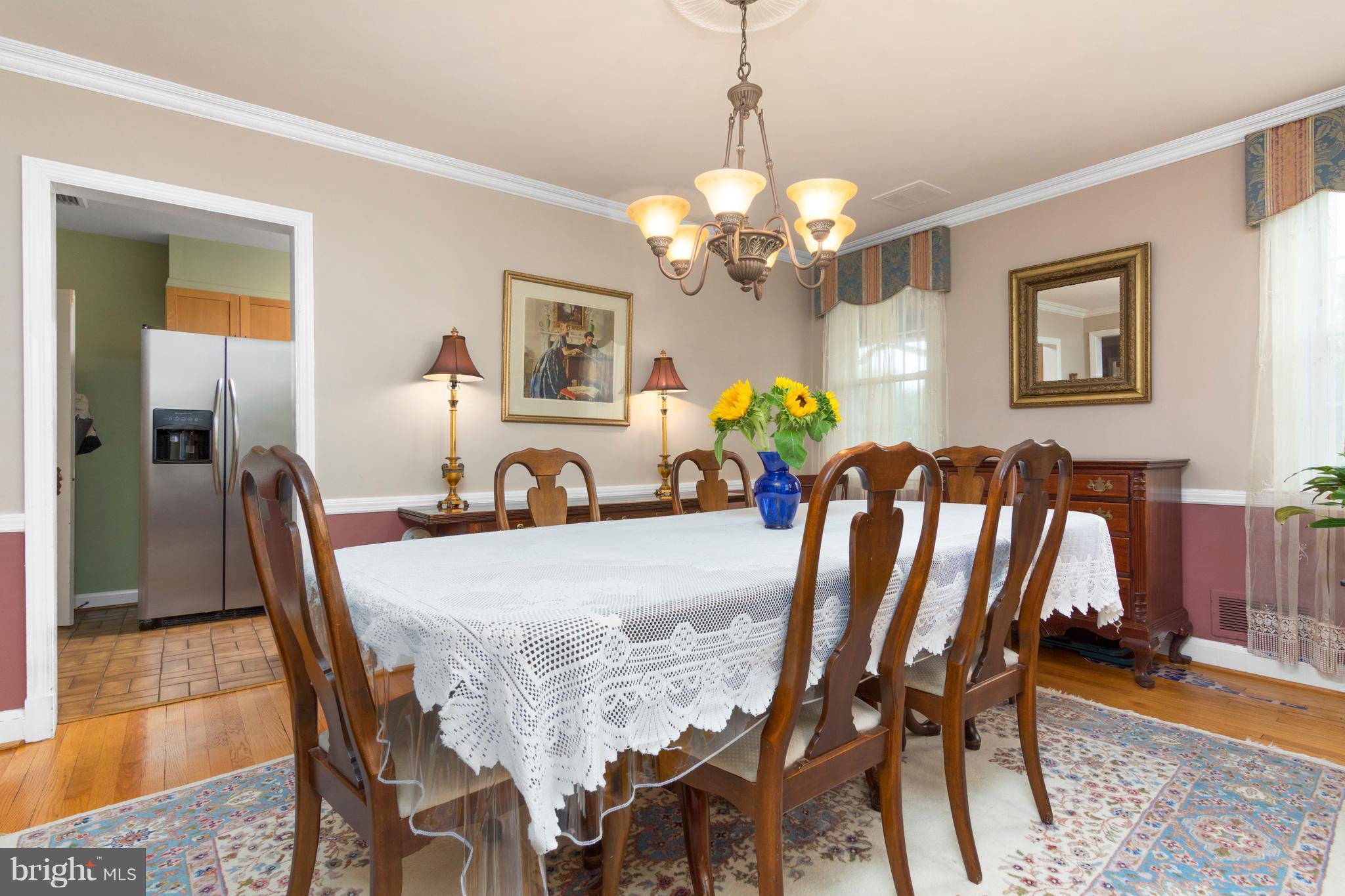 426 Academy Road Baltimore, MD 21228 - Photo 8 of 30 Dining Room illuminates with natural light